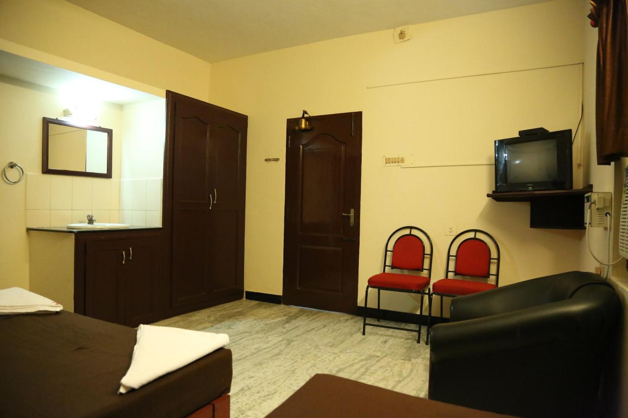Rmc Travellers Inn Chennai Ruang foto